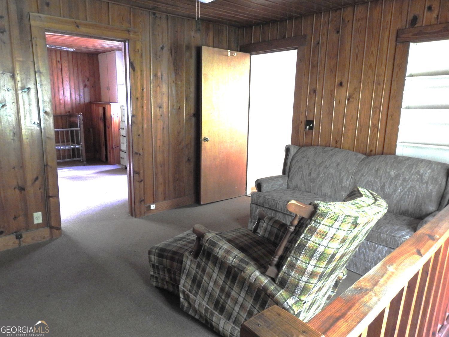 333 Lickskillet Road Epworth, GA 30541 - Photo 21 of 38 a living room with furniture and a window
