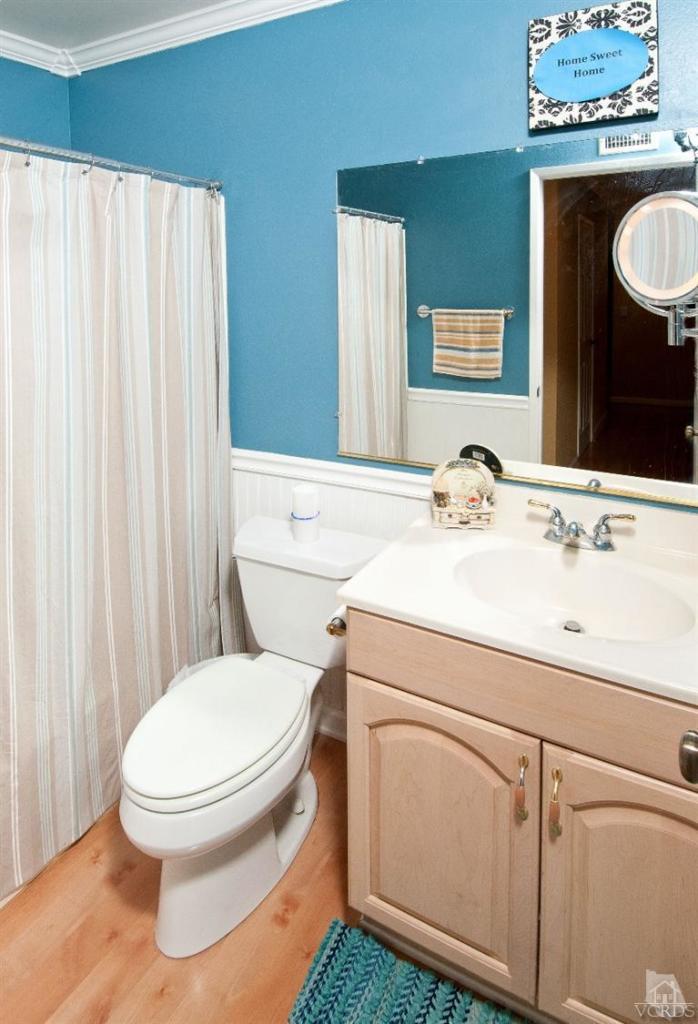 13452 East Quail Summit Road Moorpark, CA 93021 - Photo 12 of 15 a bathroom with a sink toilet and shower