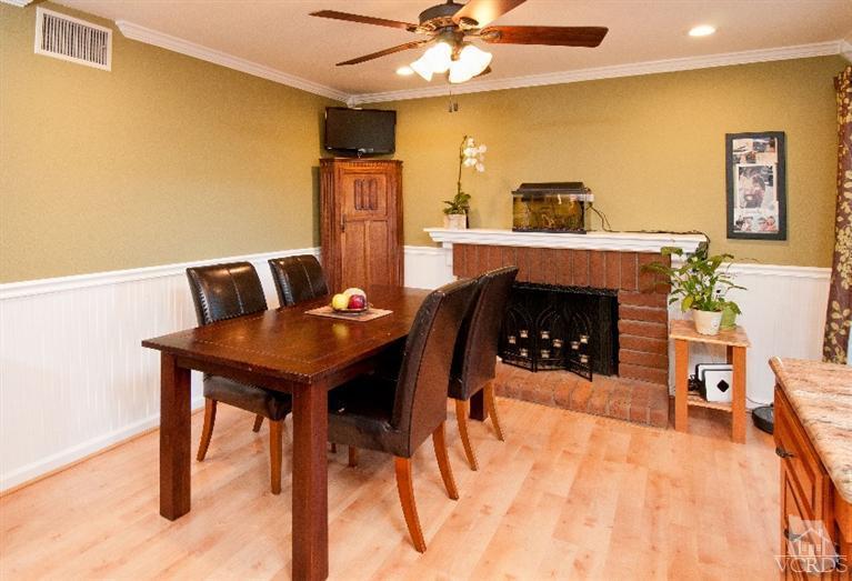 13452 East Quail Summit Road Moorpark, CA 93021 - Photo 5 of 15 a living room with furniture and a fireplace