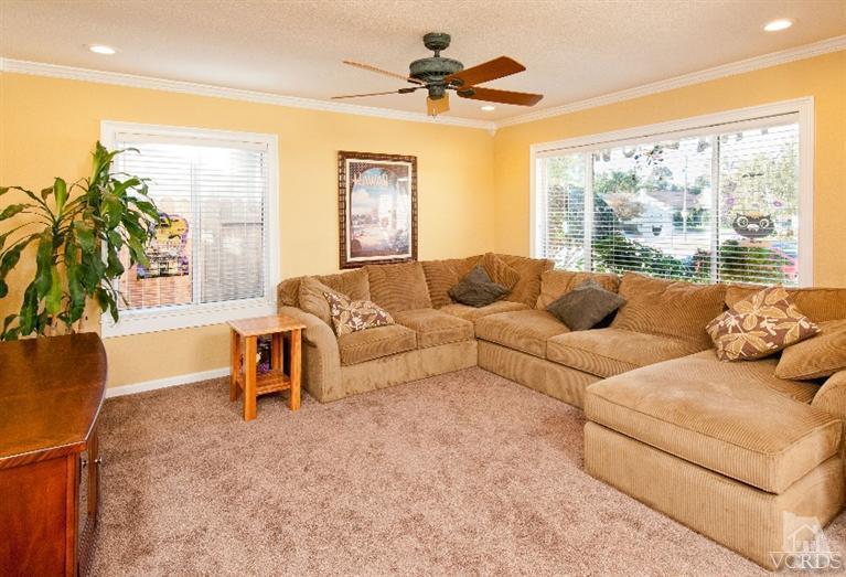 13452 East Quail Summit Road Moorpark, CA 93021 - Photo 6 of 15 a living room with furniture and a large window