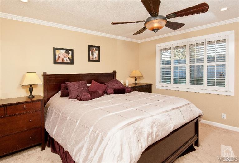 13452 East Quail Summit Road Moorpark, CA 93021 - Photo 8 of 15 a bedroom with a large bed and a window