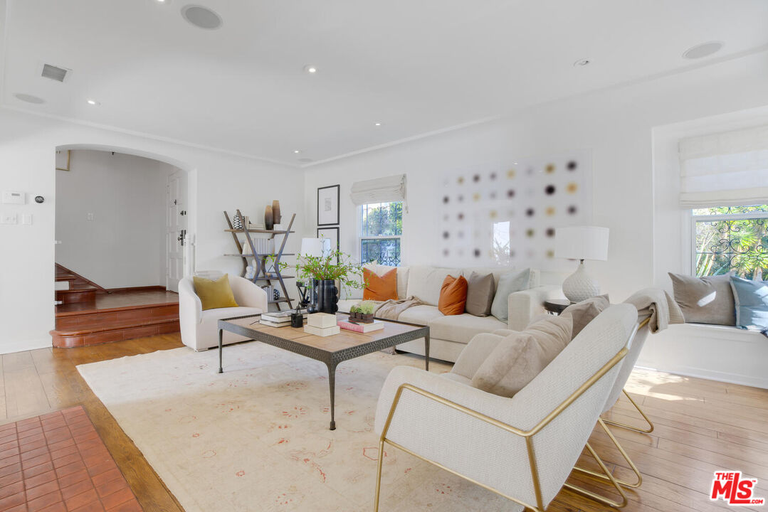 1417 Queens Road Los Angeles, CA 90069 - Photo 5 of 25 a living room with furniture and wooden floor