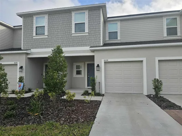 a front view of house with yard