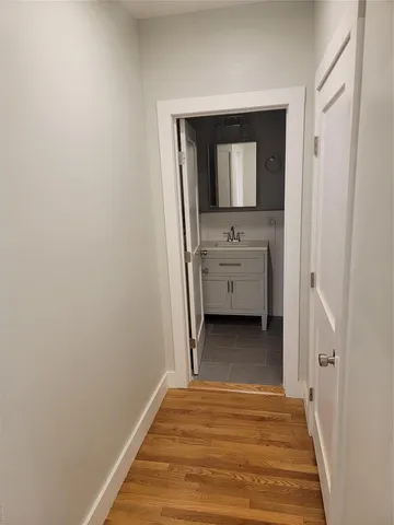 a view of a bedroom from a hallway