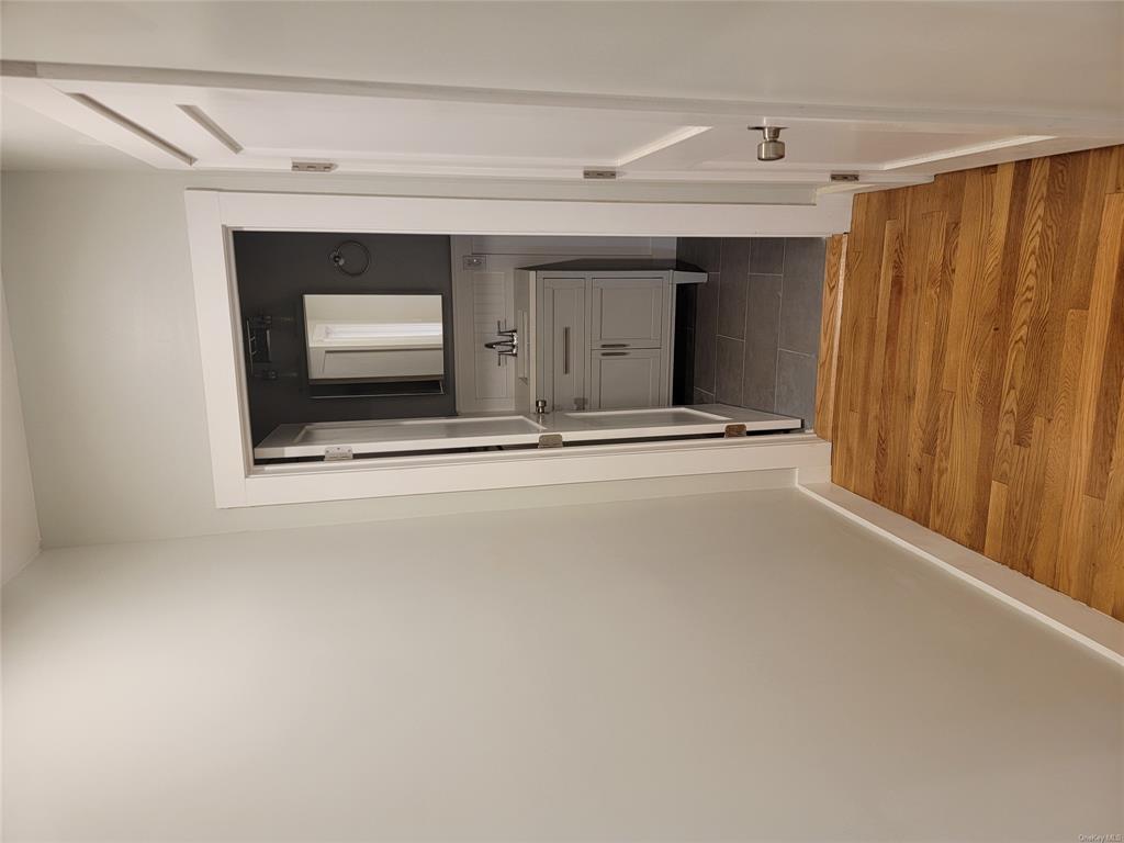 731 Broadway, Unit 2 Valhalla, NY 10595 - Photo 13 of 27 a view of a bedroom from a hallway