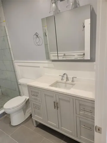 a bathroom with a sink and a toilet