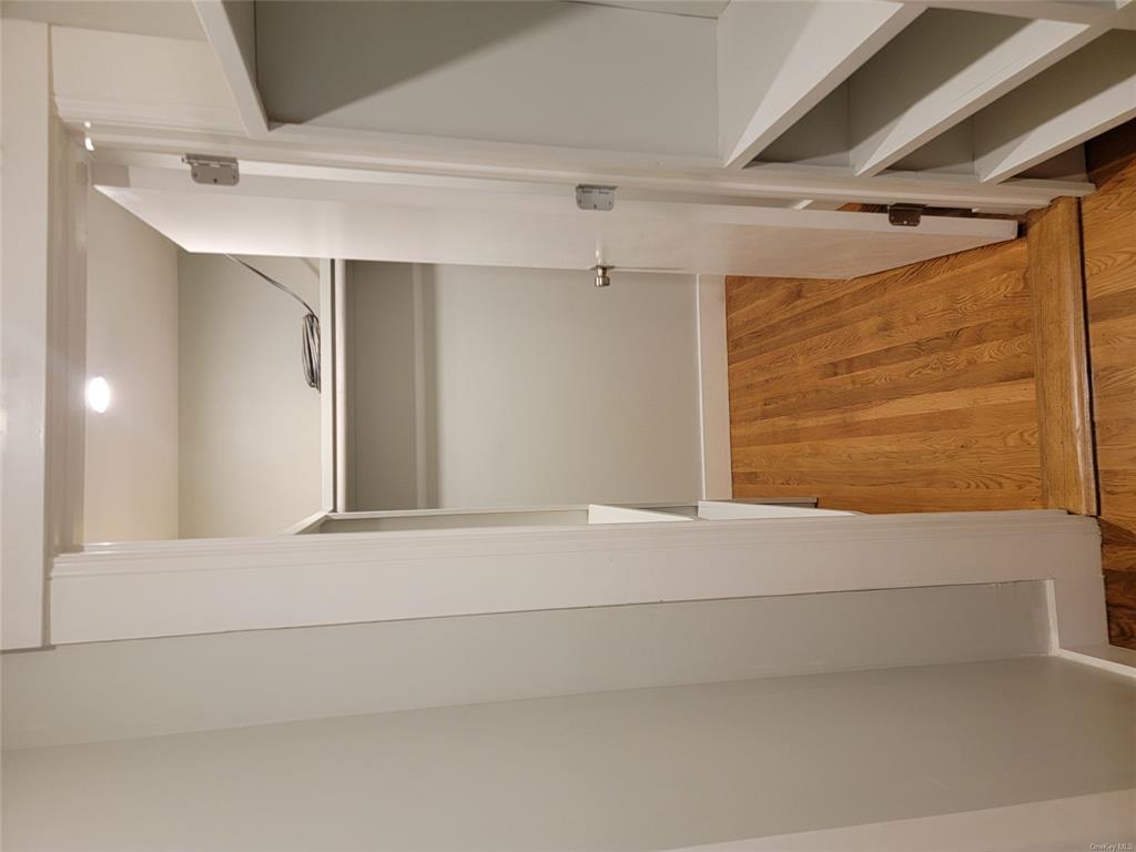 731 Broadway, Unit 2 Valhalla, NY 10595 - Photo 26 of 27 a view of walk in closet with wooden floor