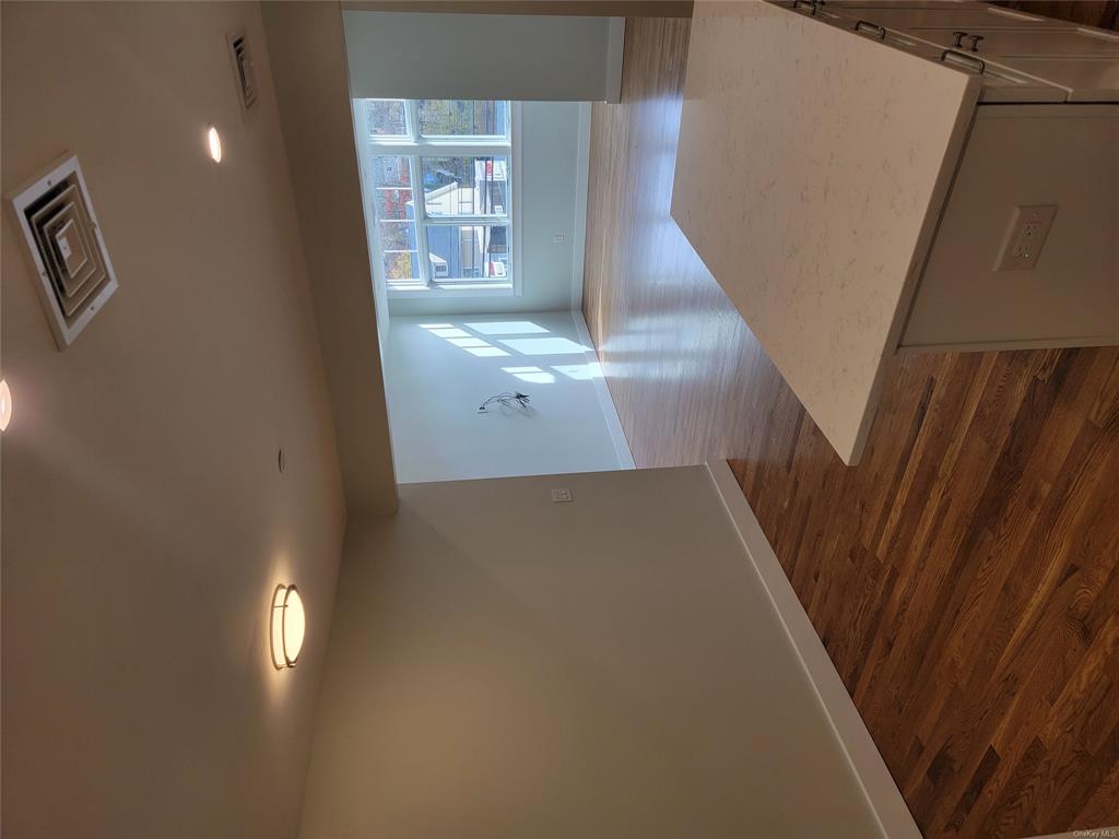 731 Broadway, Unit 2 Valhalla, NY 10595 - Photo 9 of 27 a view of a room with wooden floor