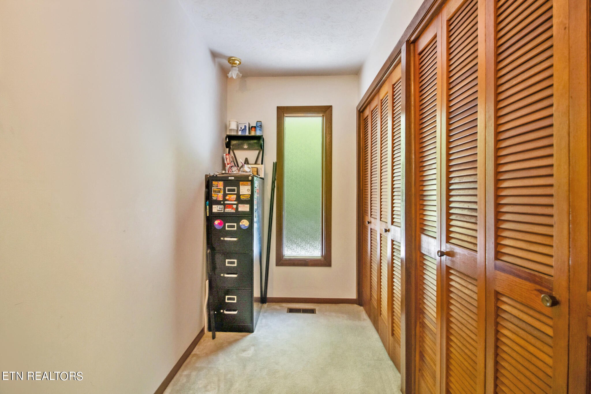 1620 Bell Road Crossville, TN 38571 - Photo 19 of 54 an empty room with closet