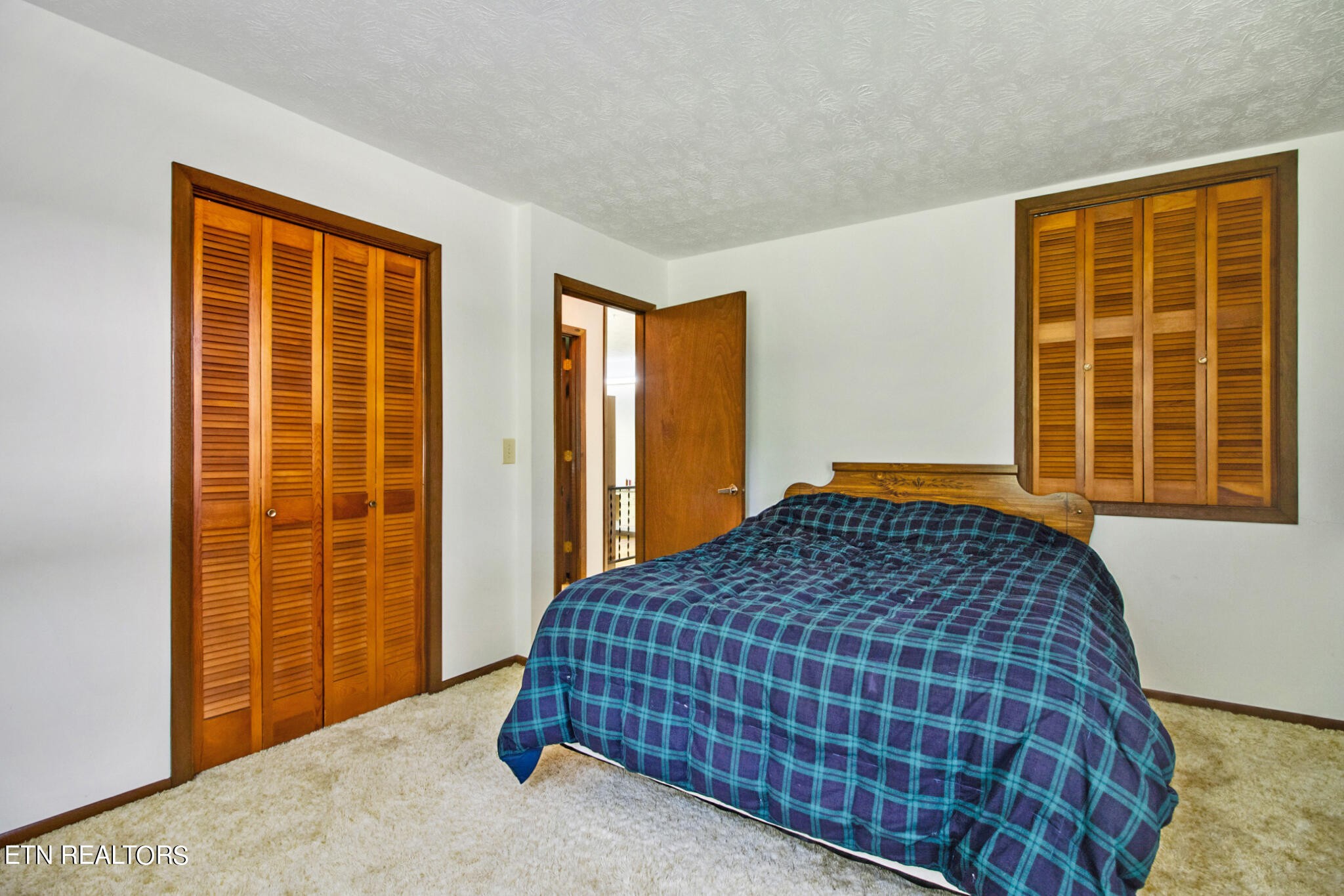 1620 Bell Road Crossville, TN 38571 - Photo 22 of 54 a bedroom with a bed and a window