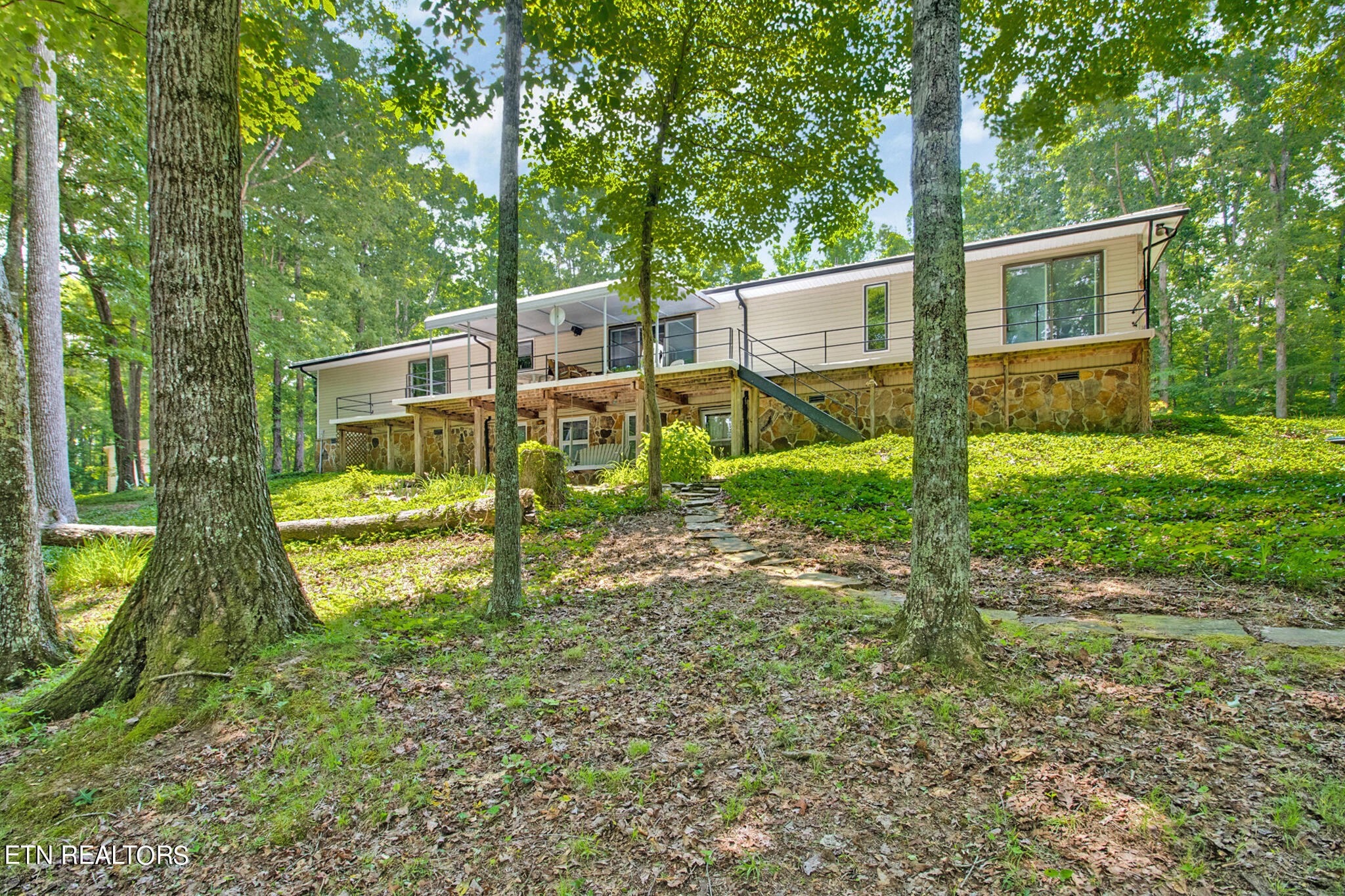 1620 Bell Road Crossville, TN 38571 - Photo 38 of 54 a view of a house with backyard