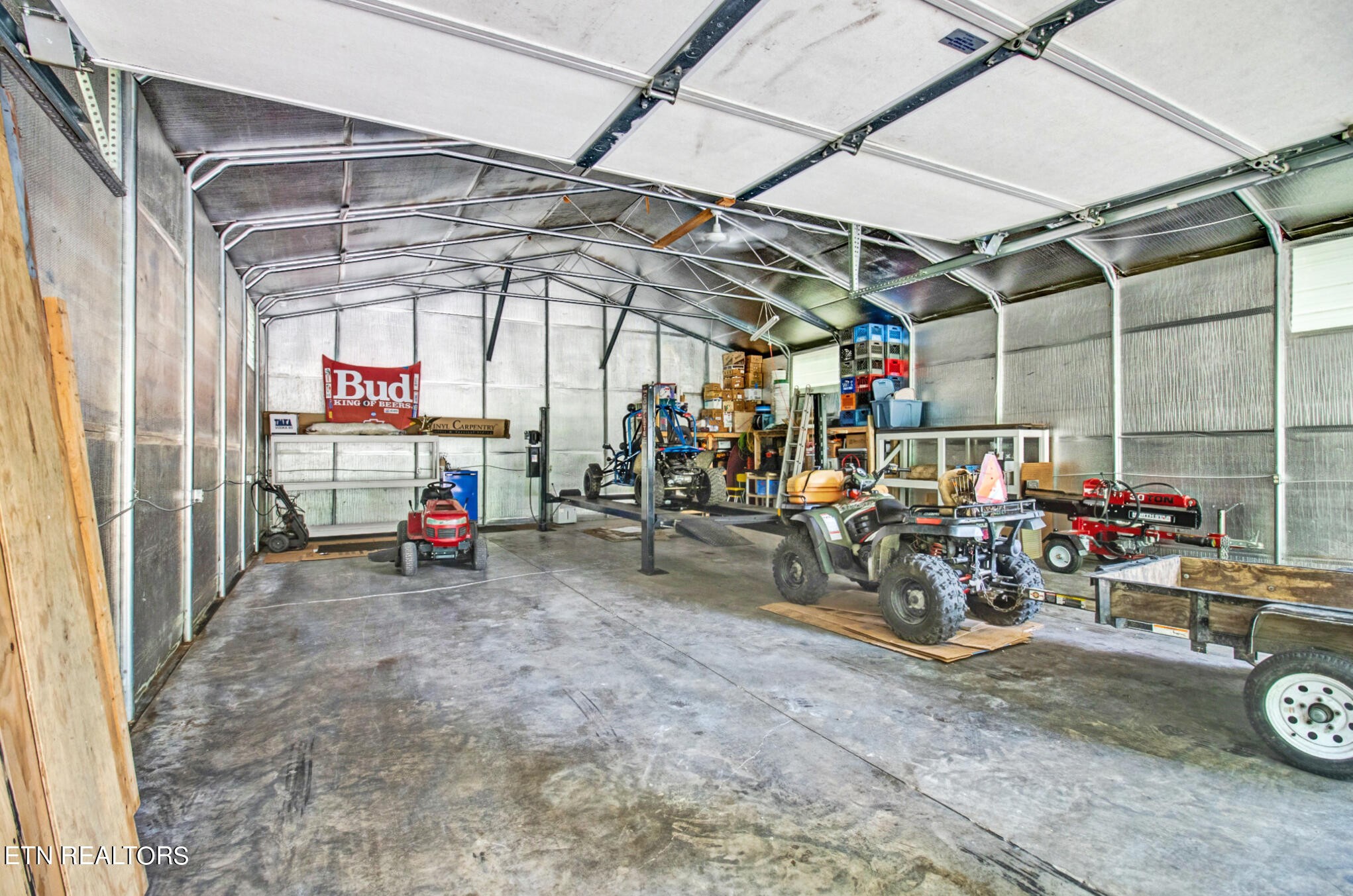 1620 Bell Road Crossville, TN 38571 - Photo 41 of 54 a view of a storage room with a lot of stuff