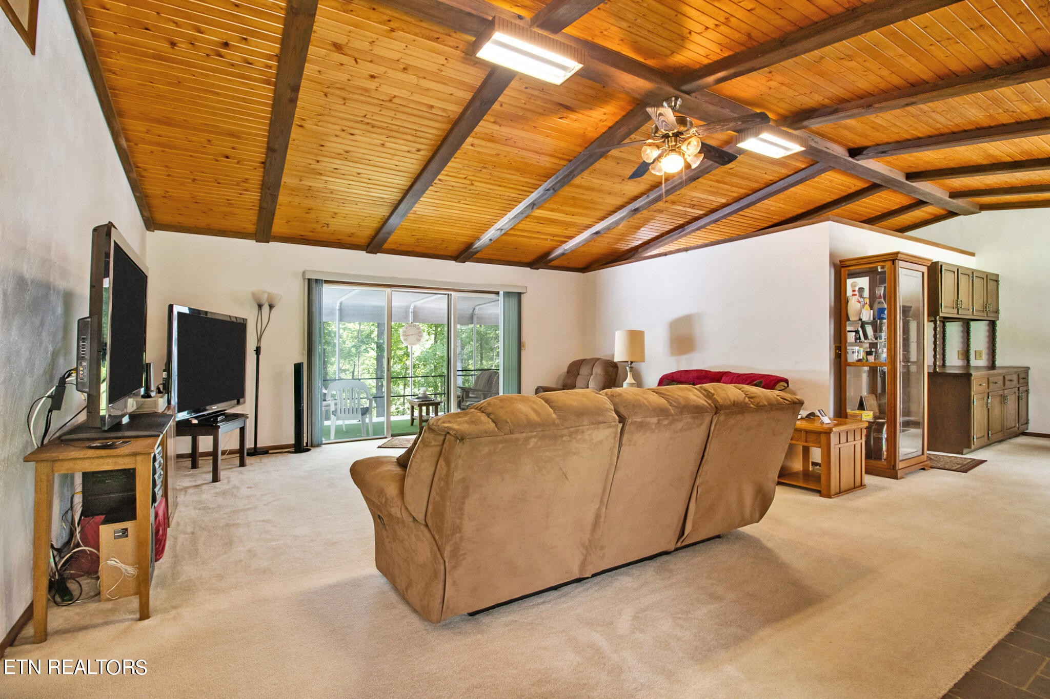 1620 Bell Road Crossville, TN 38571 - Photo 6 of 54 a living room with furniture and a flat screen tv