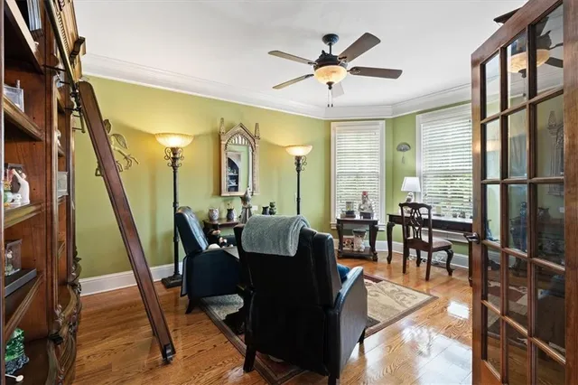a kitchen with stainless steel appliances granite countertop wooden cabinets and a sink