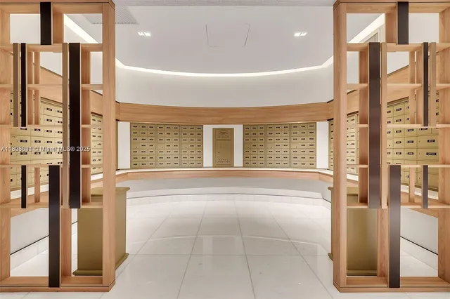 a room with gym equipment and a view of living room