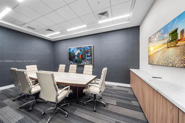a vase of flowers sitting on a table