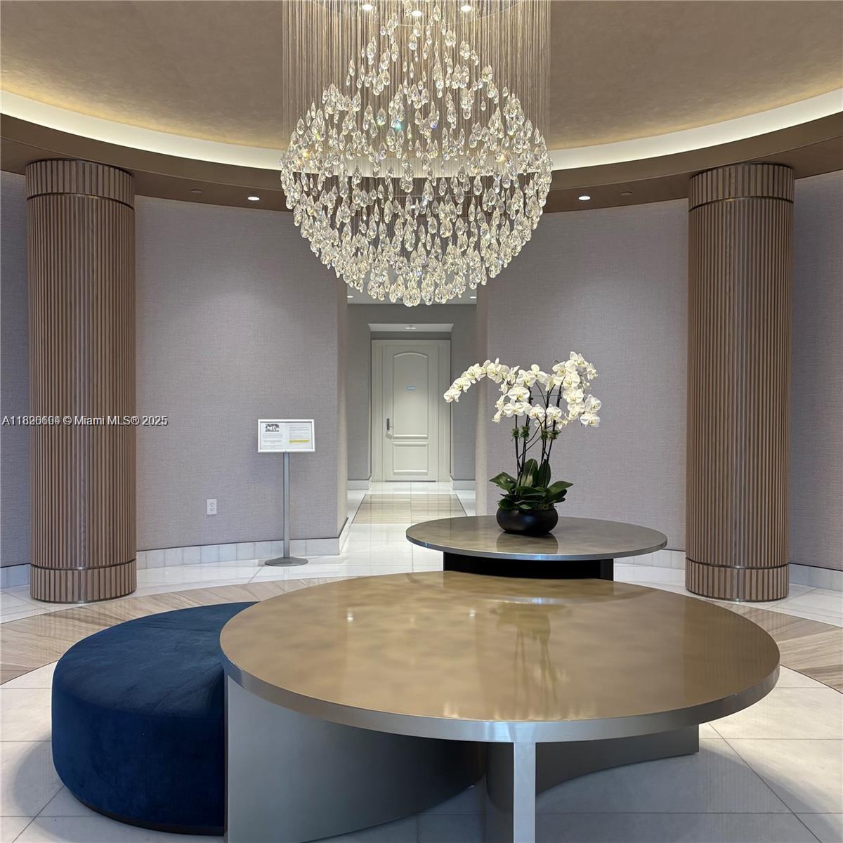 888 Brickell Key Drive, Unit 2607 Miami, FL 33131 - Photo 43 of 43 a vase of flowers sitting on a table