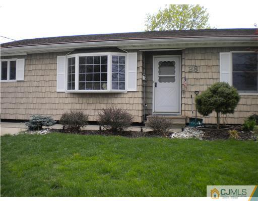 28 Purdue Road Old Bridge, NJ 08859 - Photo 1 of 25 a front view of a house with a garden and yard