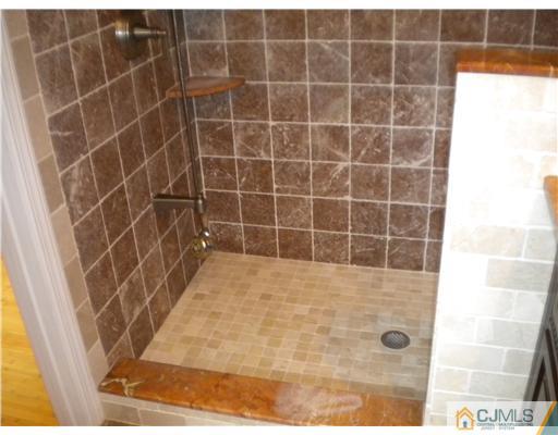 28 Purdue Road Old Bridge, NJ 08859 - Photo 15 of 25 a bathroom with a shower
