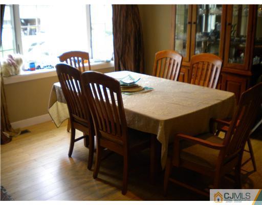 28 Purdue Road Old Bridge, NJ 08859 - Photo 8 of 25 a view of a dining room with furniture and wooden floor
