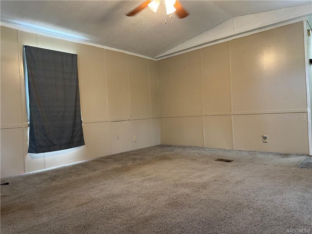 5590 Northwest 76th Avenue Chiefland, FL 32626 - Photo 6 of 22 a view of an empty room
