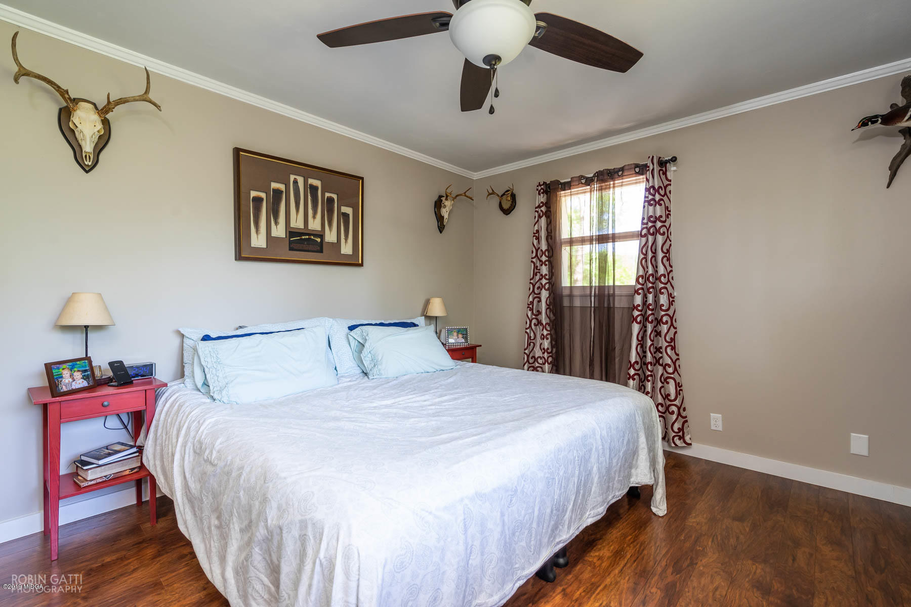 1613 Dames Ferry Road Forsyth, GA 31029 - Photo 11 of 23 a bedroom with bed and window