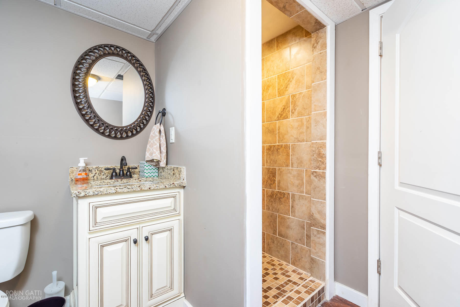 1613 Dames Ferry Road Forsyth, GA 31029 - Photo 17 of 23 a bathroom with a toilet and a sink
