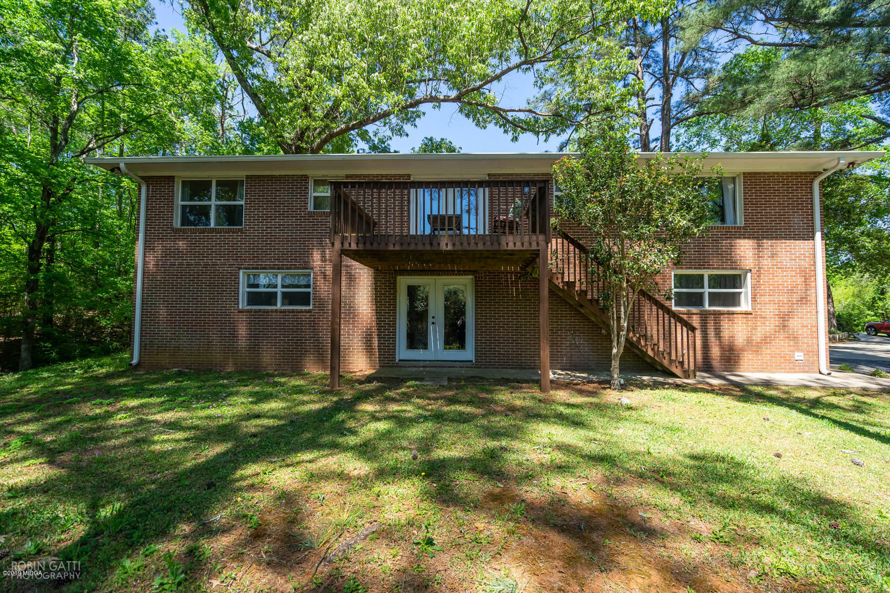 1613 Dames Ferry Road Forsyth, GA 31029 - Photo 22 of 23 a view of a house with a yard