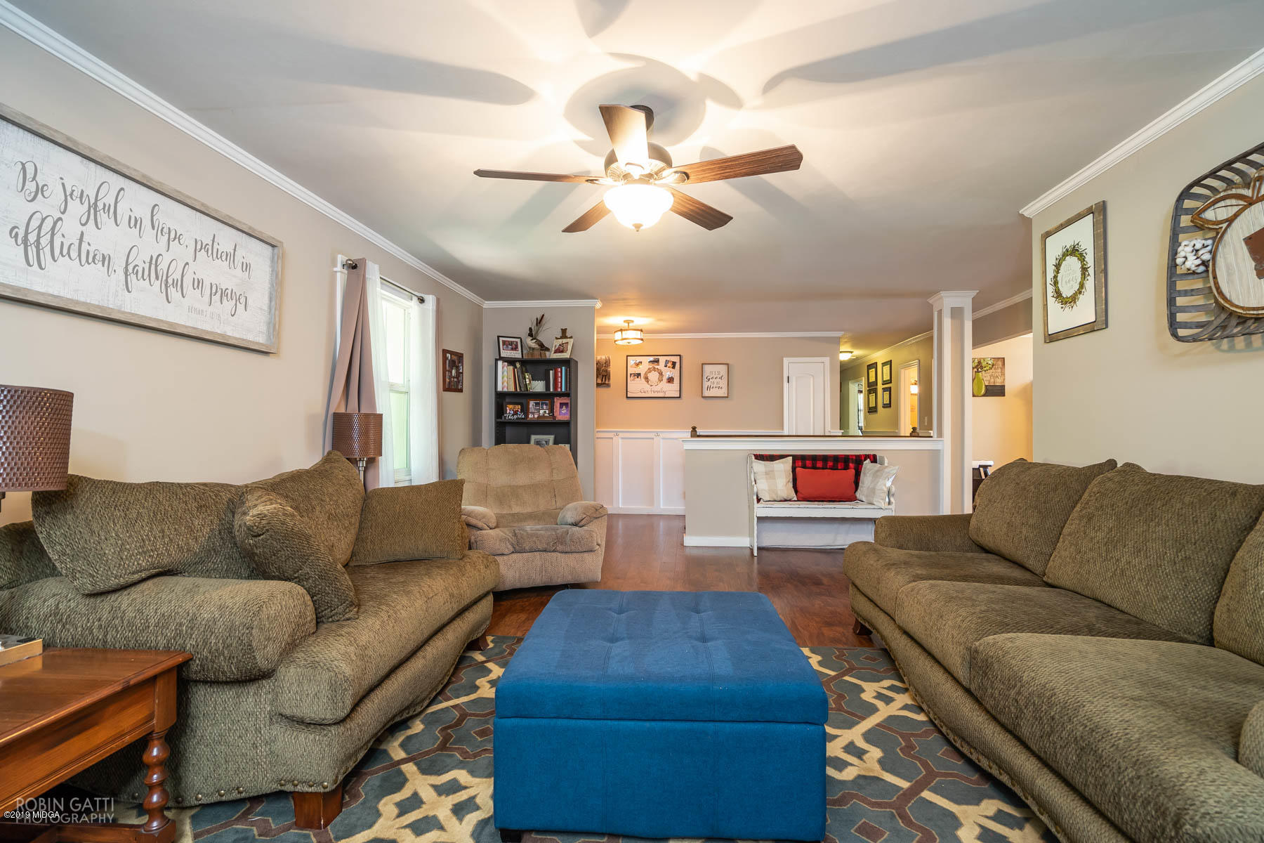 1613 Dames Ferry Road Forsyth, GA 31029 - Photo 5 of 23 a living room with furniture and a flat screen tv