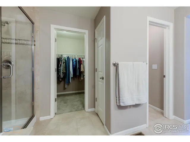 a view of a bathroom from the hallway