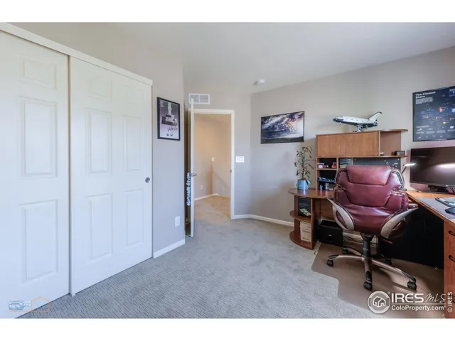 a room with furniture and air hockey table