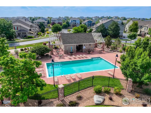 an aerial view of a house with a garden