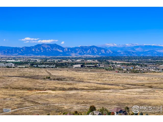 a view of an ocean and a mountain