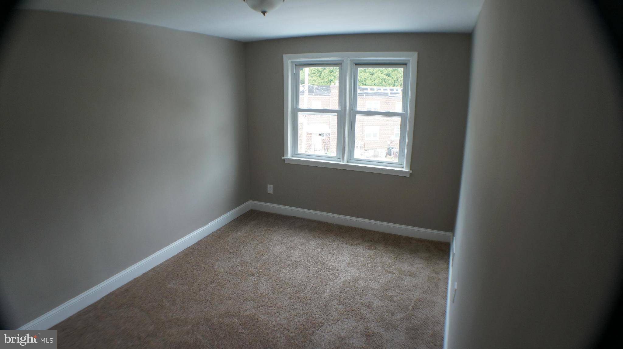 1233 Kevin Road Baltimore, MD 21229 - Photo 11 of 22 an empty room with a window