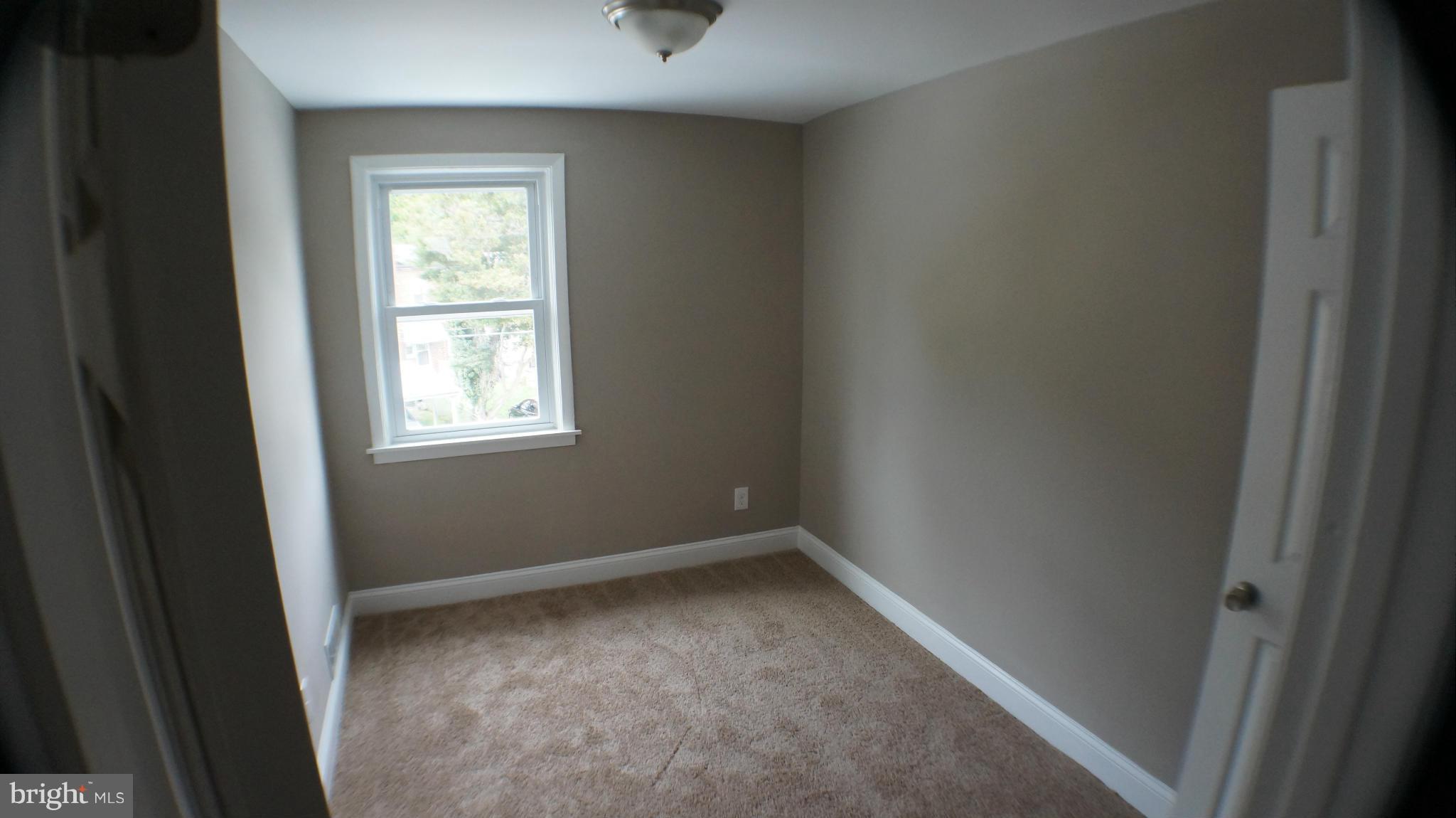 1233 Kevin Road Baltimore, MD 21229 - Photo 13 of 22 an empty room with a window