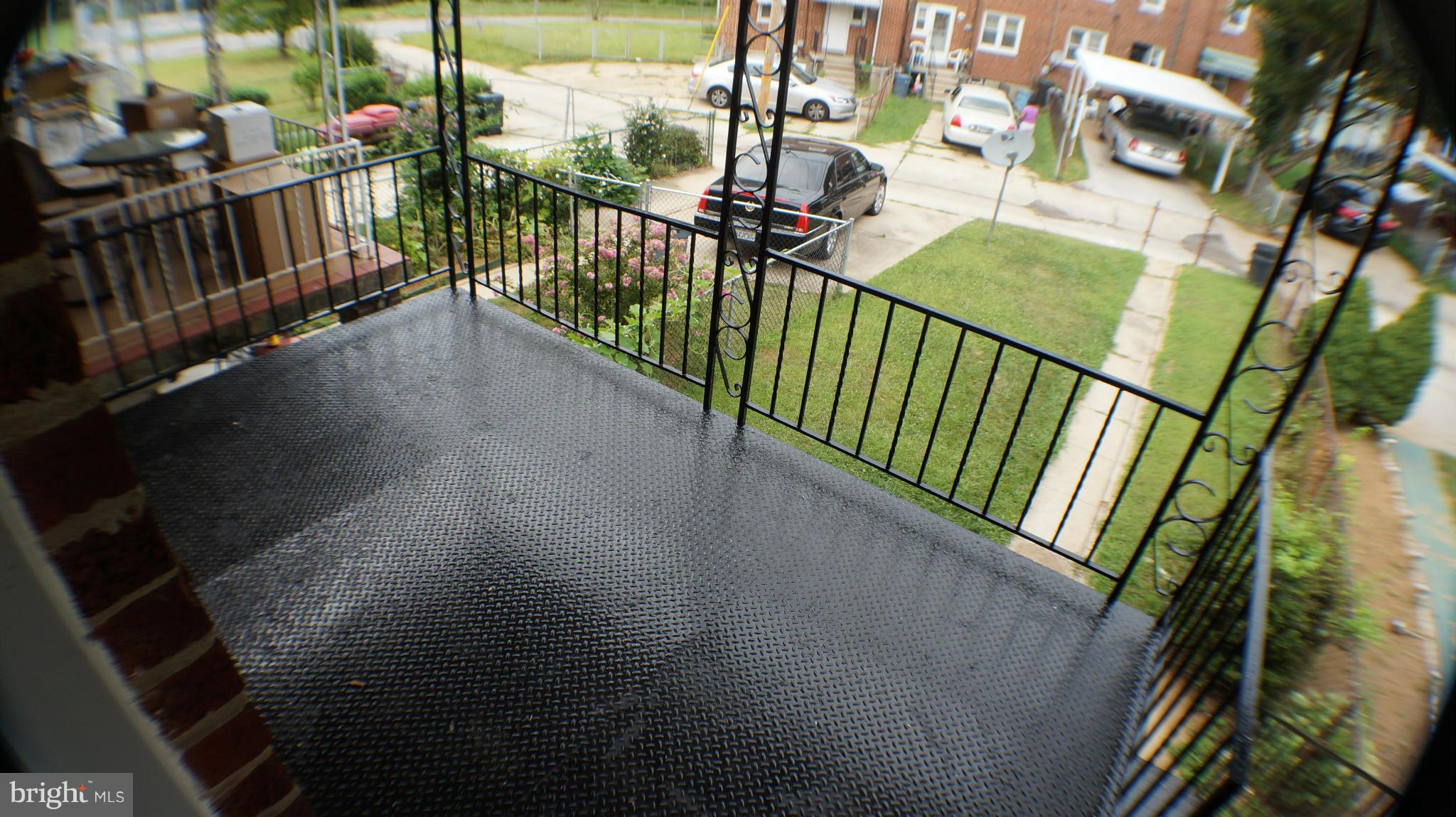 1233 Kevin Road Baltimore, MD 21229 - Photo 16 of 22 a view of balcony with furniture