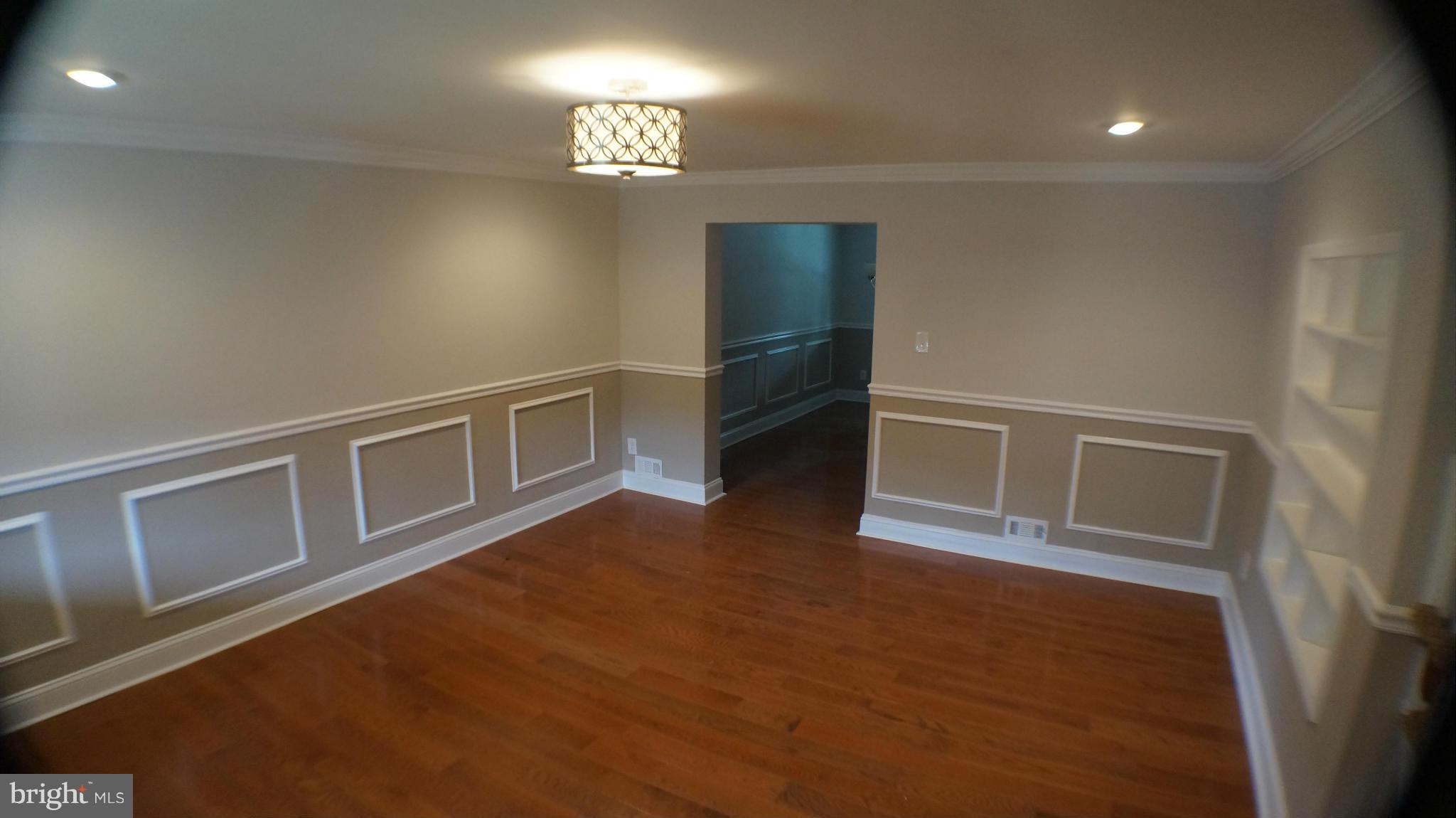 1233 Kevin Road Baltimore, MD 21229 - Photo 3 of 22 a view of an empty room with a window