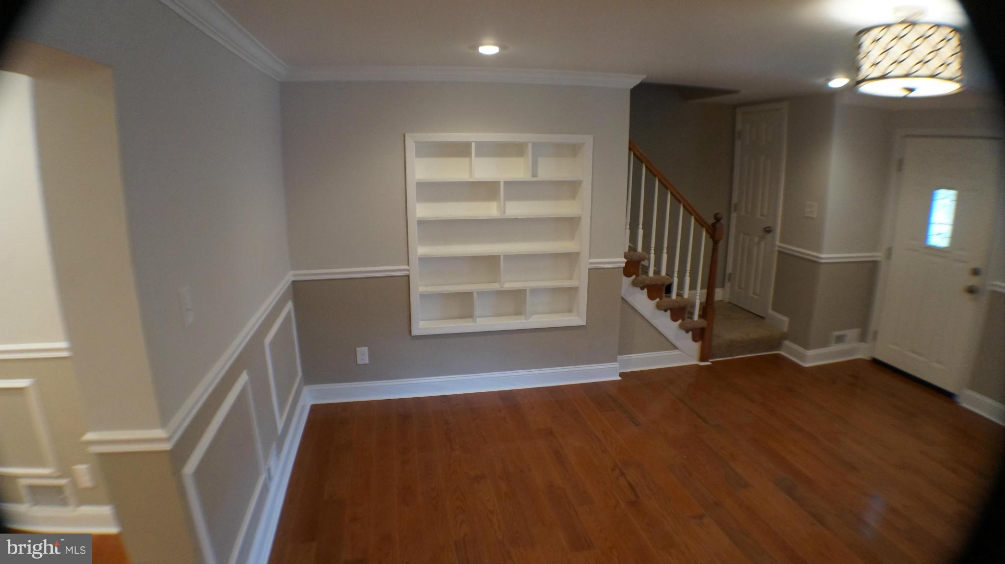 1233 Kevin Road Baltimore, MD 21229 - Photo 4 of 22 a view of an empty room with a window