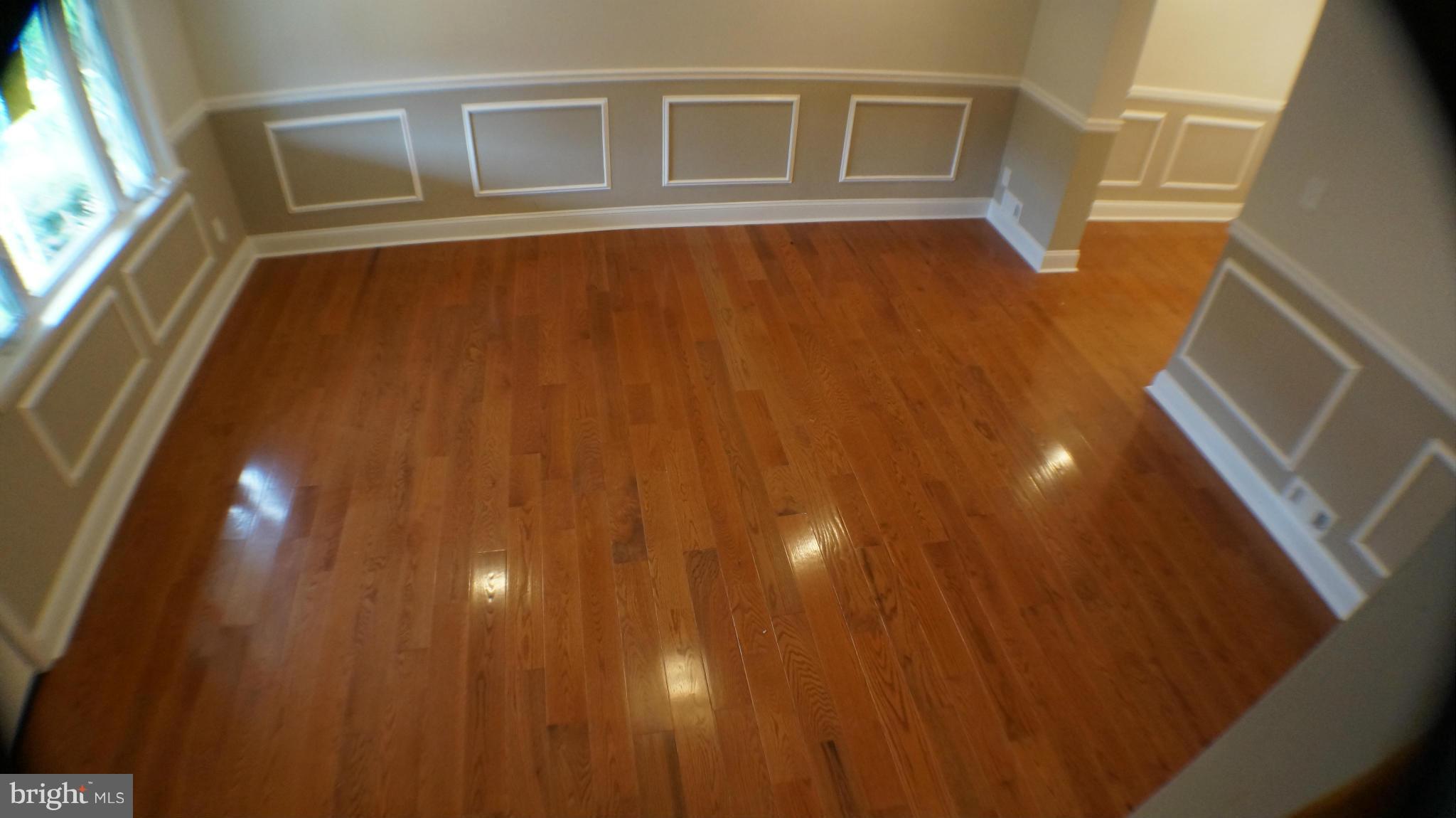 1233 Kevin Road Baltimore, MD 21229 - Photo 5 of 22 a view of an empty room with a window