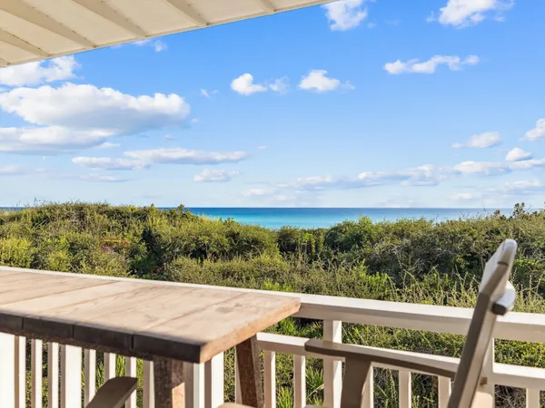 a view of a balcony with an outdoor space