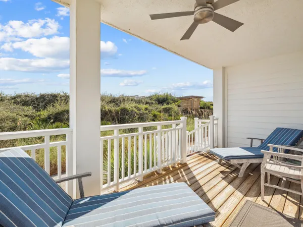 a view of balcony and wooden floor