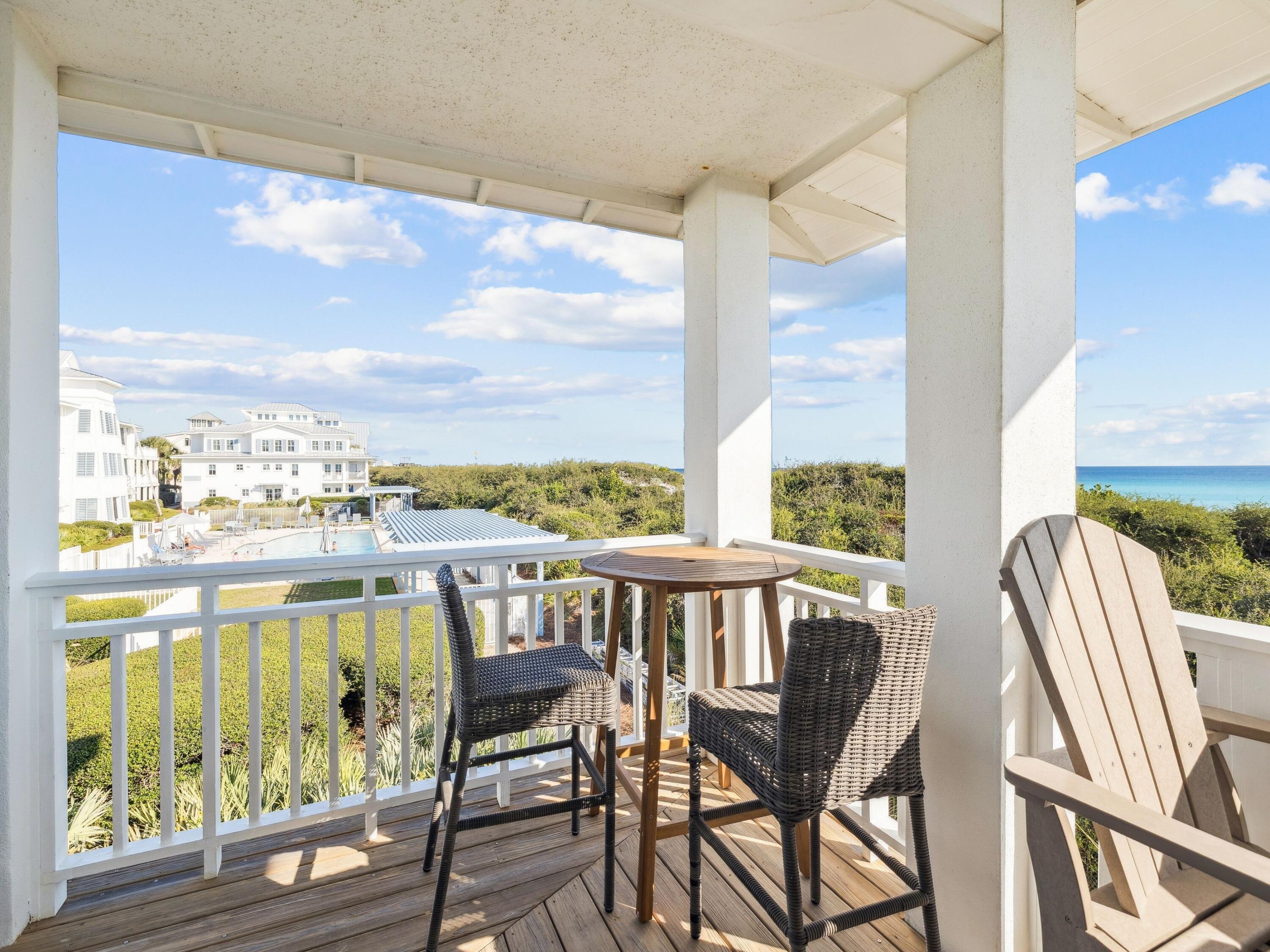 1848 East County Highway 30A, Unit 2 Santa Rosa Beach, FL 32459 - Photo 21 of 37 a view of a dining room with furniture window and wooden floor