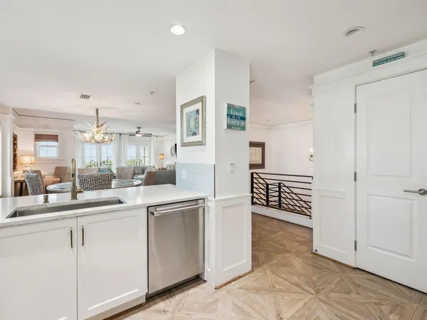 a kitchen with cabinets and window