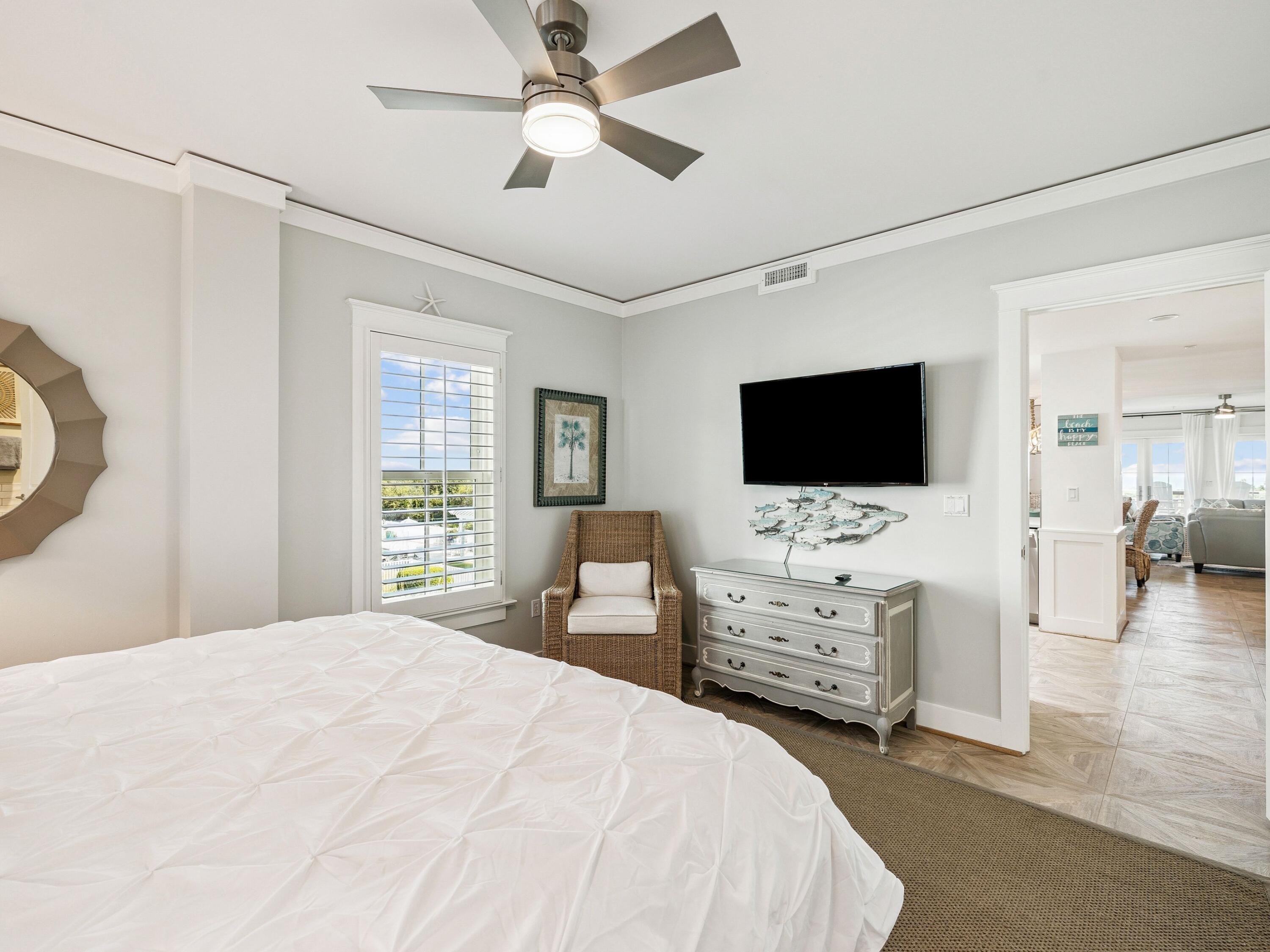 1848 East County Highway 30A, Unit 2 Santa Rosa Beach, FL 32459 - Photo 28 of 37 a bedroom with a bed flat screen tv and a window