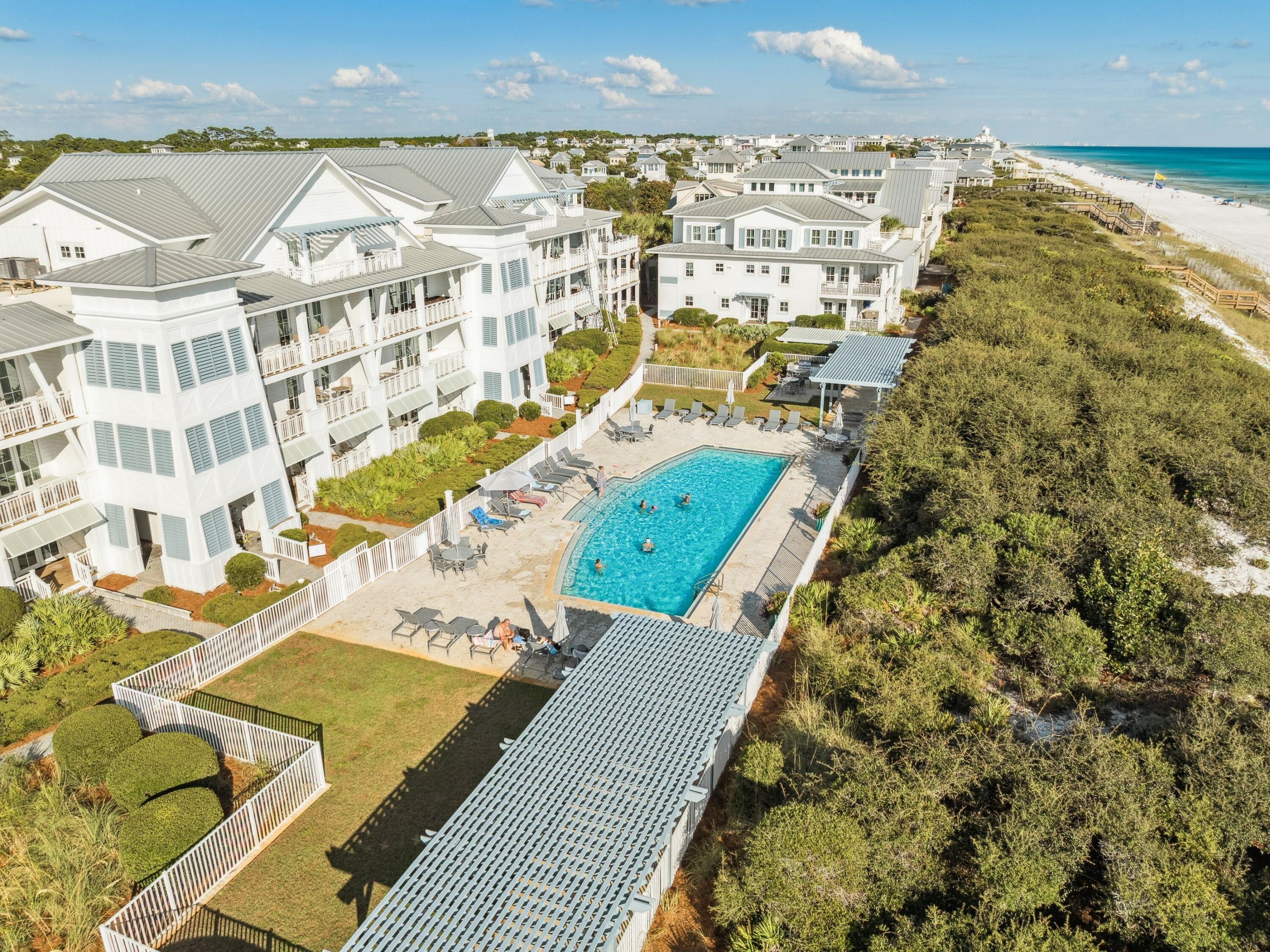 1848 East County Highway 30A, Unit 2 Santa Rosa Beach, FL 32459 - Photo 36 of 37 an aerial view of residential houses with outdoor space