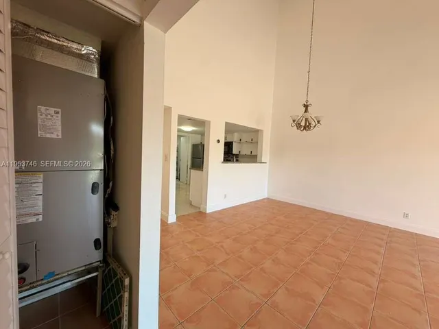 a view of empty room with windows