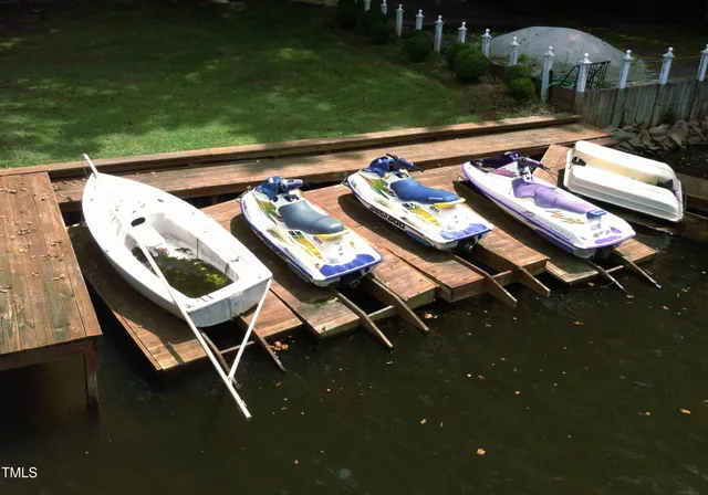 a kitchen with stainless steel appliances granite countertop a stove a microwave and a refrigerator