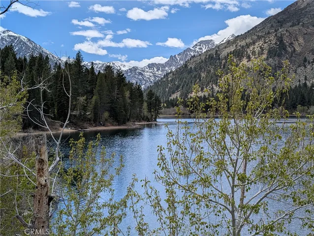 a view of a lake with a mountain