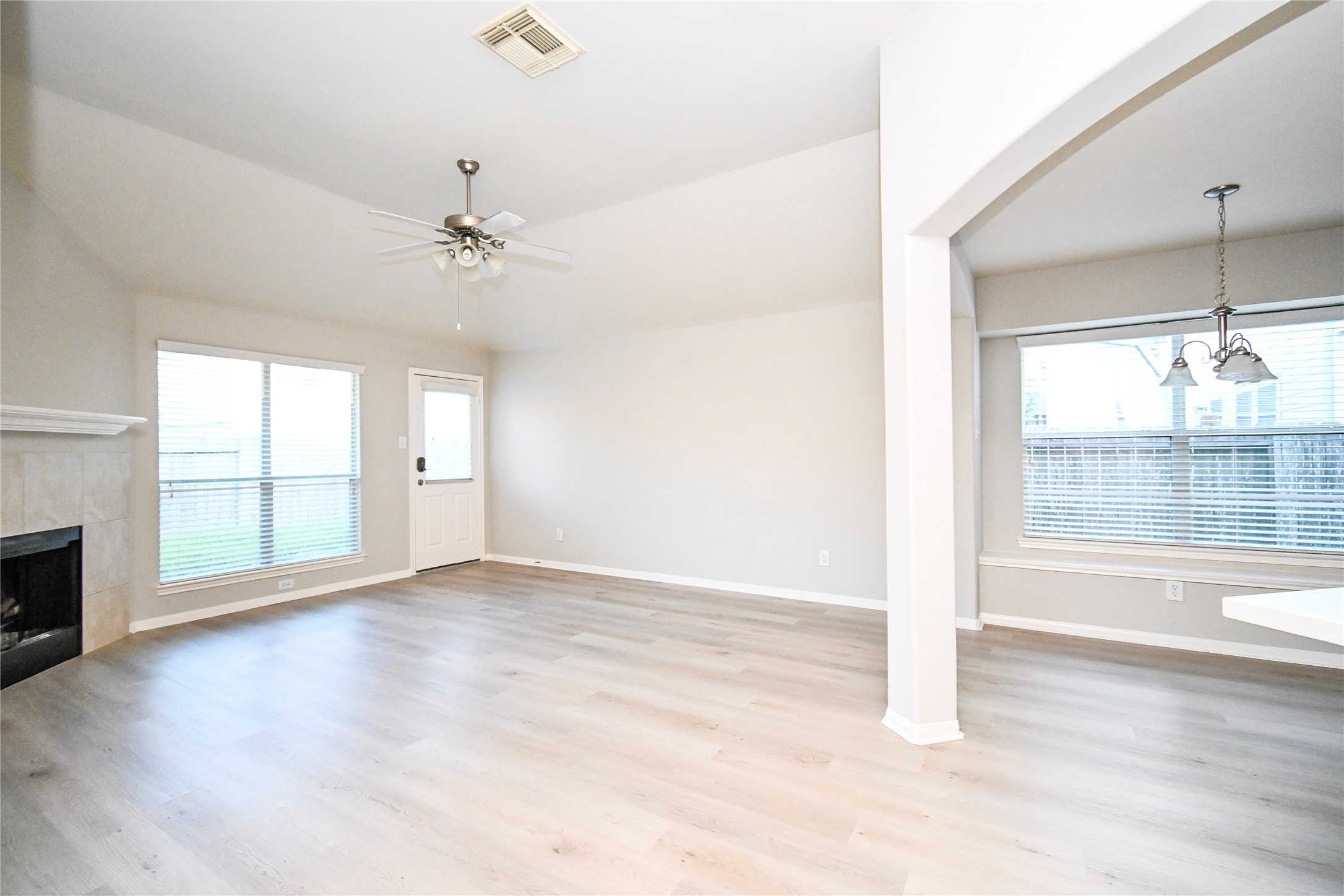 3111 Myrtle Ranch Drive Katy, TX 77494 - Photo 11 of 27 a view of an empty room with a window and wooden floor