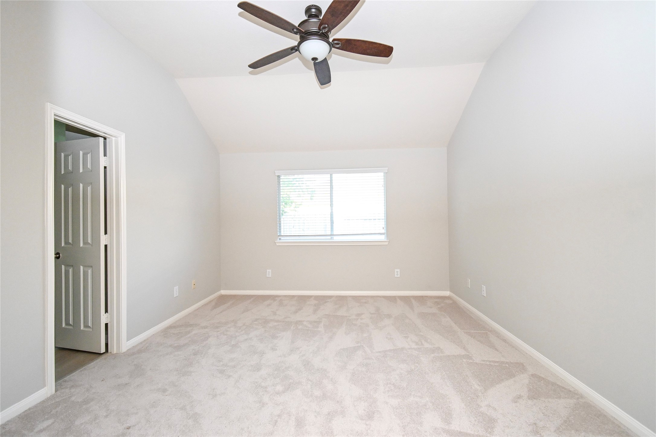 3111 Myrtle Ranch Drive Katy, TX 77494 - Photo 18 of 27 an empty room with windows and fan